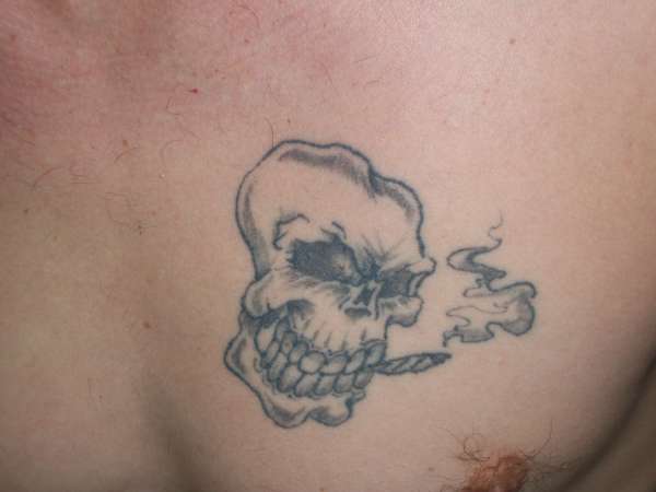 skull getting high tattoo