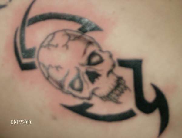 skull tribal tattoo