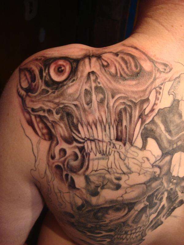 top left shoulder tattoo