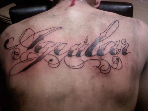 'Aguilar" tattoo
