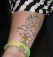 Frangipani tat tattoo