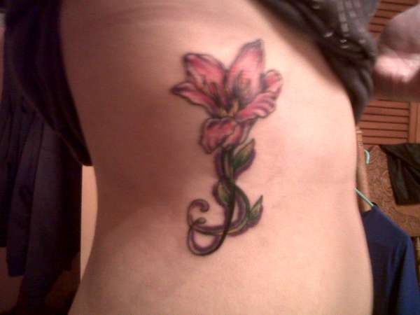 Lily Rib Cage Tattoo tattoo