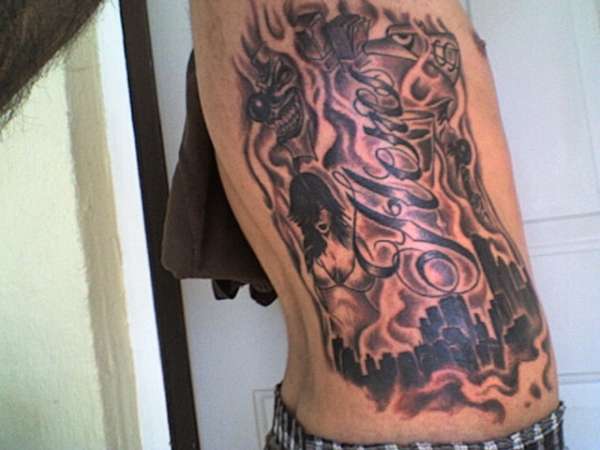 Rib Piece tattoo