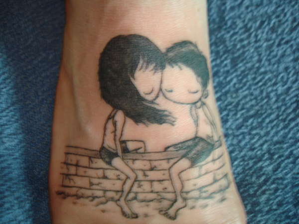girl/boy on foot tattoo