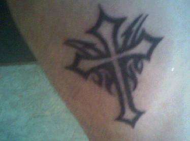 Gothic styled cross tattoo