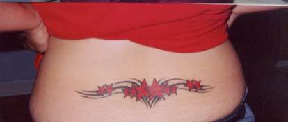 Star Tribal on my lower back tattoo