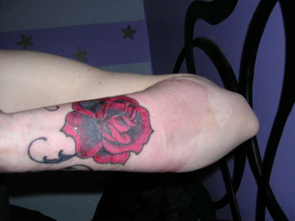 rose cover tattoo