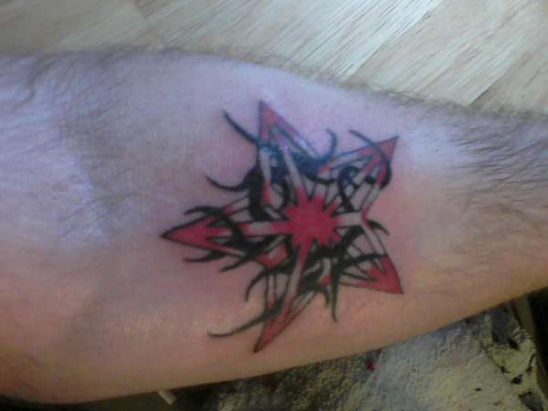 star/tribal tattoo
