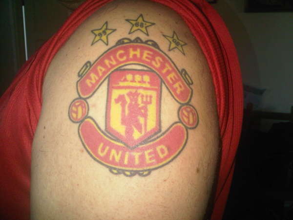 Man Utd Badge with Champions League Stars tattoo