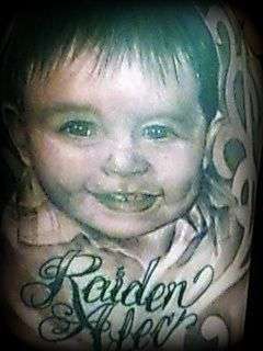 Portrait of my son tattoo