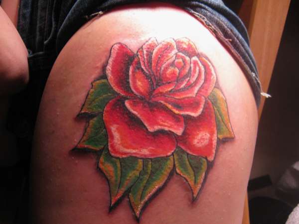 rose outer thigh tattoos
