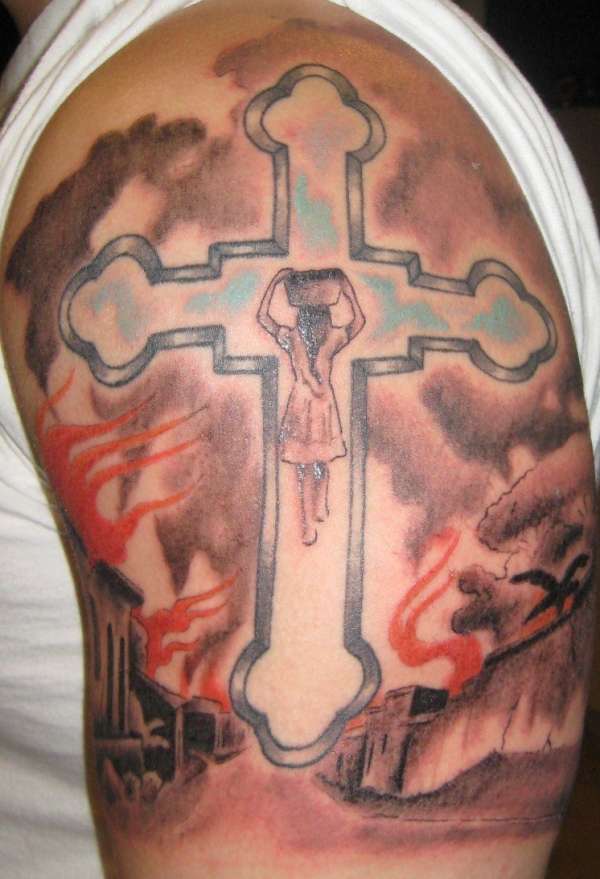 cross and salvadoran village tattoo