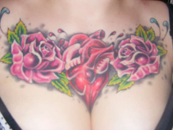 human heart and 2  roses, chest peice. tattoo