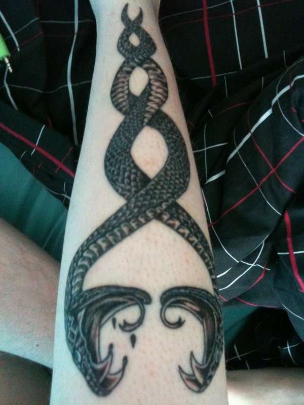 metal gear snakes tattoo