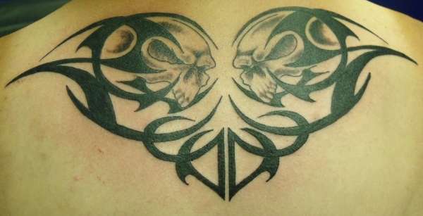 skulls and tribal tattoo