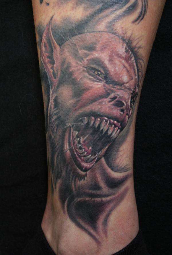 Half Bat/Wolf creature tattoo
