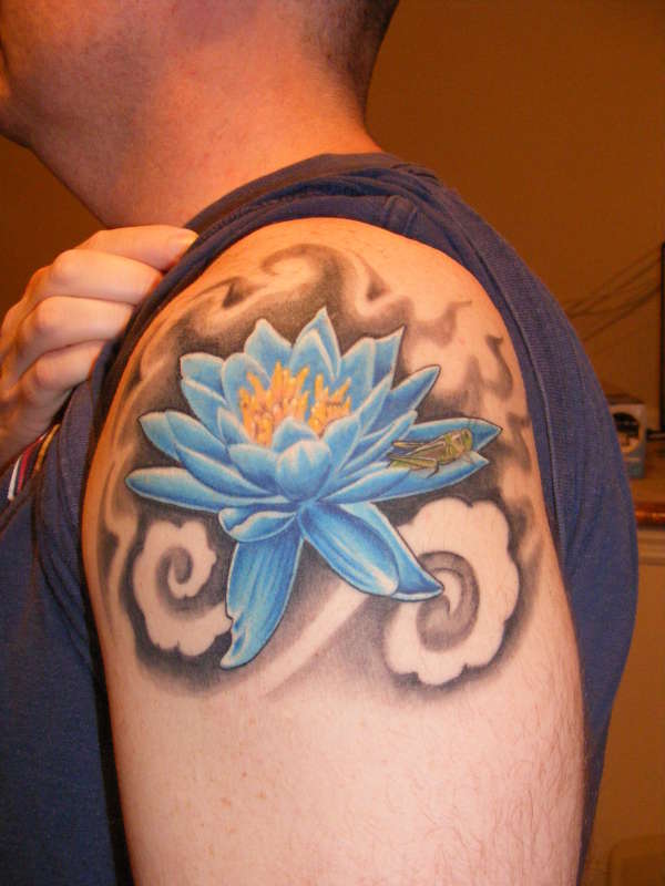 Lotus flower with grasshopper tattoo