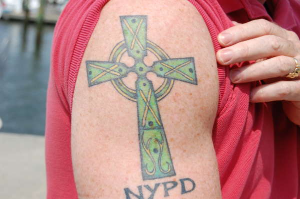NYPD under Celtic Cross tattoo