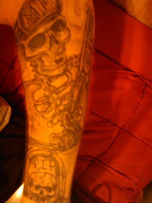 Skull shotty tattoo