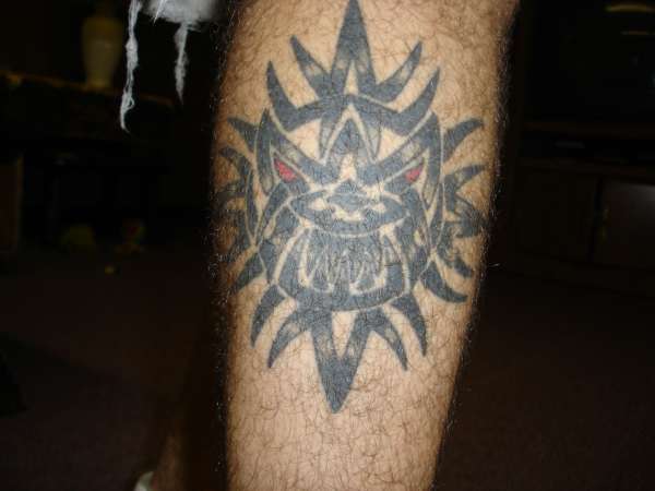 tribal sun tattoo