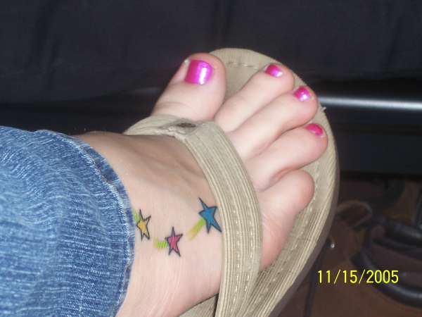 stars on foot tattoo