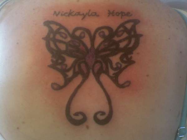 tribal butterfly tattoo