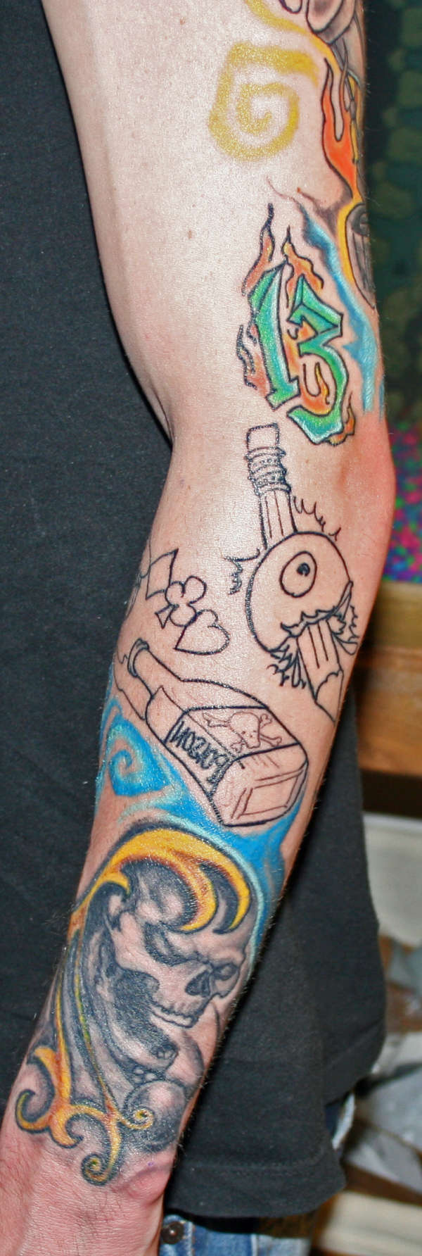 unfinished jail style sleeve tattoo