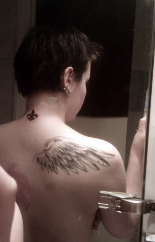 Angel wings tattoo
