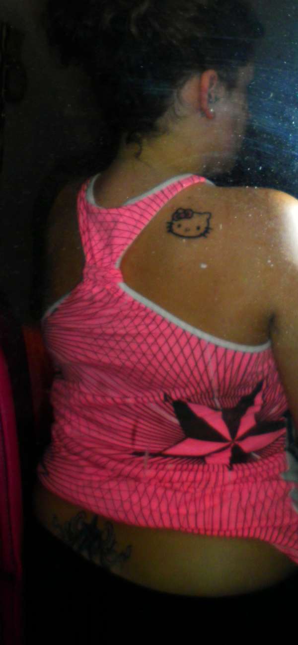 Hello Kitty and Nautical Star tattoo