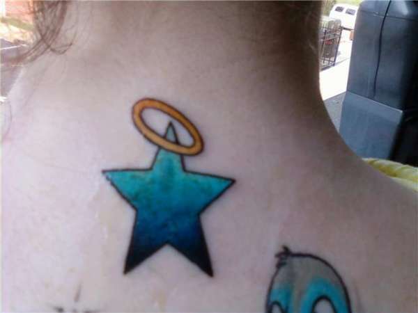 Mike's Star tattoo