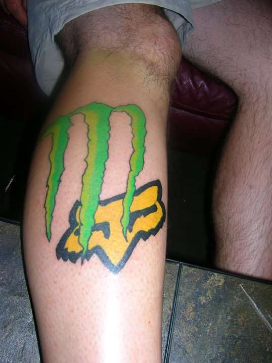 Monster Energy and Fox Racing tattoo