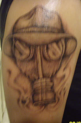 Psycho Realm Gas Mask tattoo