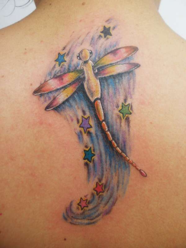 dragonfly in upper back tattoo