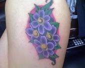 flower cover up tattoo