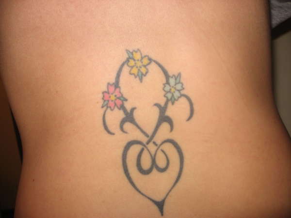 heart floral back tattoo