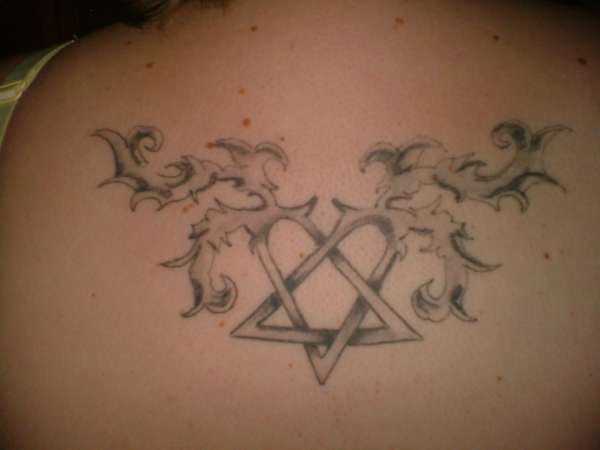 heartagram with flames tattoo