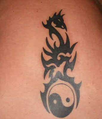 Triback_back tattoo