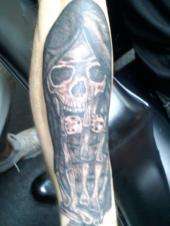snake eyes reaper tattoo