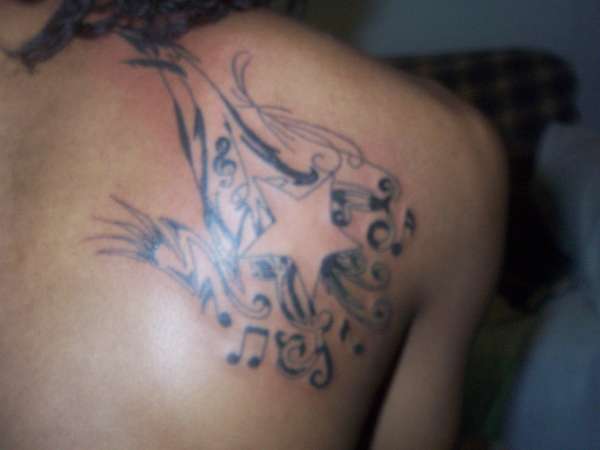 star with music notes tattoo