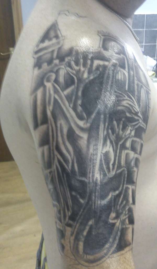 tat from another angle tattoo