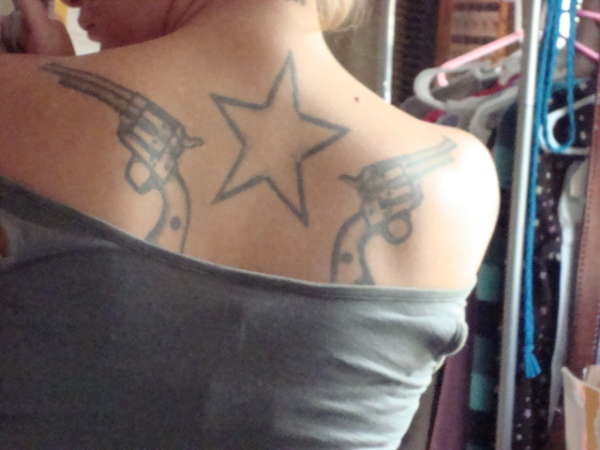 Guns & Star tattoo
