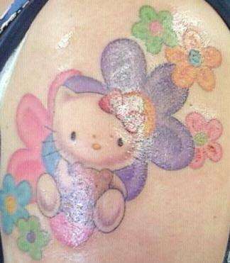 Hello Kitty and Flowers tattoo