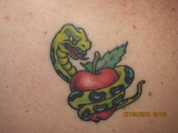 Snake around apple tattoo