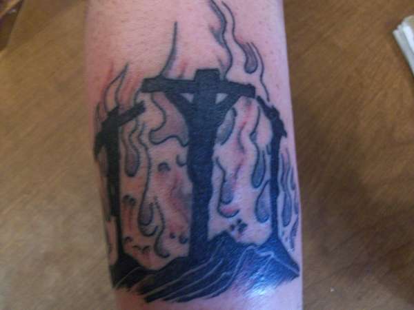 Three cross with flames tell me what you think tattoo