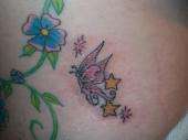 butterfly with sparkles tattoo