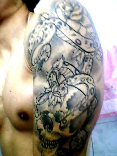 skull and snake tattoo