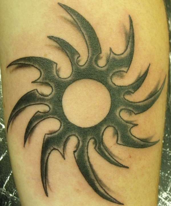 tribal sun tattoo