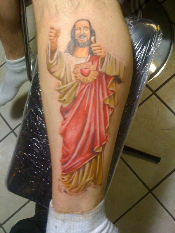 Buddy Christ tattoo