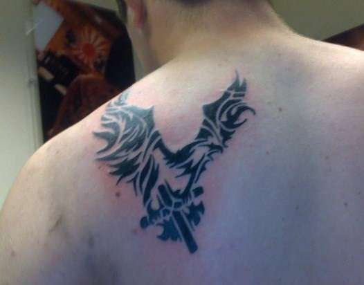 Eagle with cross tattoo tattoo