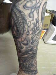 Fighting dragons tattoo